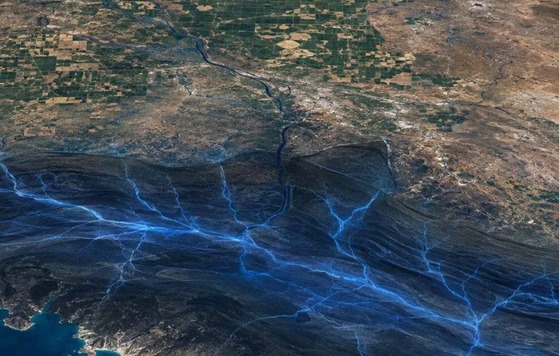 Ilustración conceptual de estructuras de agua subterránea sobre imagen satelital